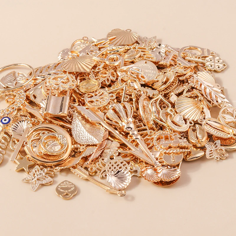 Leslie Mixed 10/50 Stück vergoldete Legierung Blume Tier Stern Mond Herz Kreuz Unendlichkeit Charms Anhänger für DIY Schmuckherstellung Bulk – Detail 4