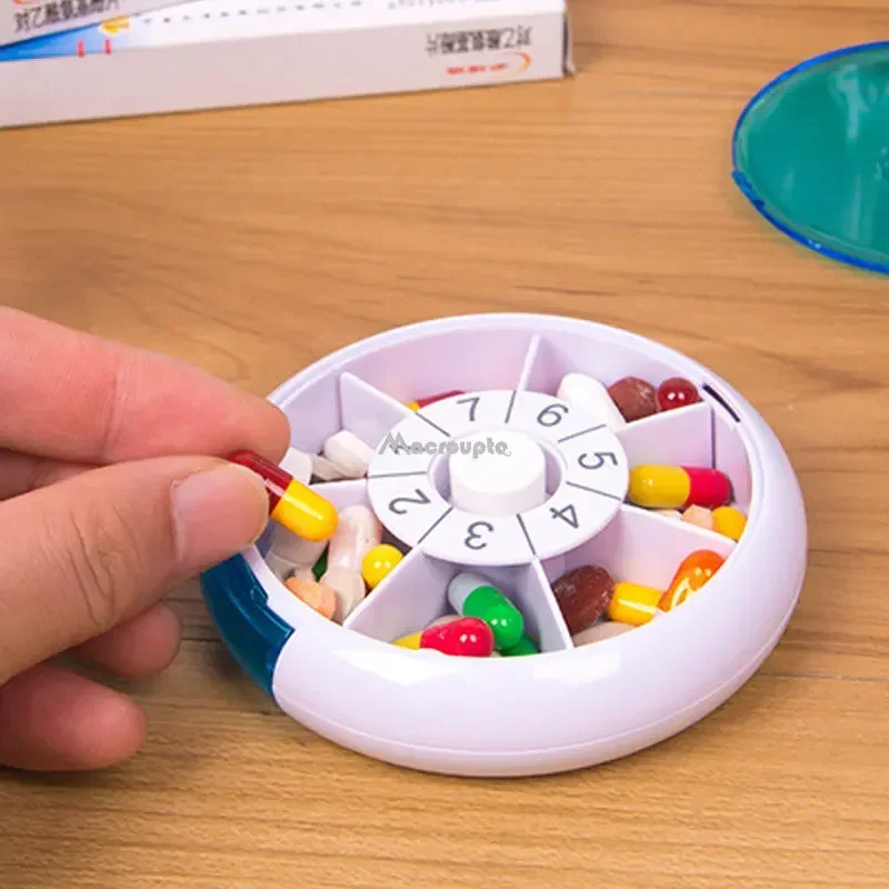 Compact Blue Rotating Pill Organizer - Travel-Friendly Weekly Medicine Case