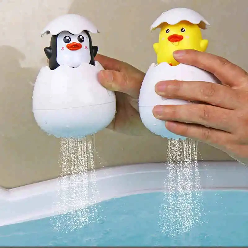 

Kids Cute Suction floating water spray penguin yellow duck dinosaur egg Baby Bathing Toy Sprinkling Shower Swimming baby toys