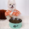 A pet dog bowl in the shape of a cartoon footprint, made of thickened stainless steel, suitable for indoor and outdoor use 3