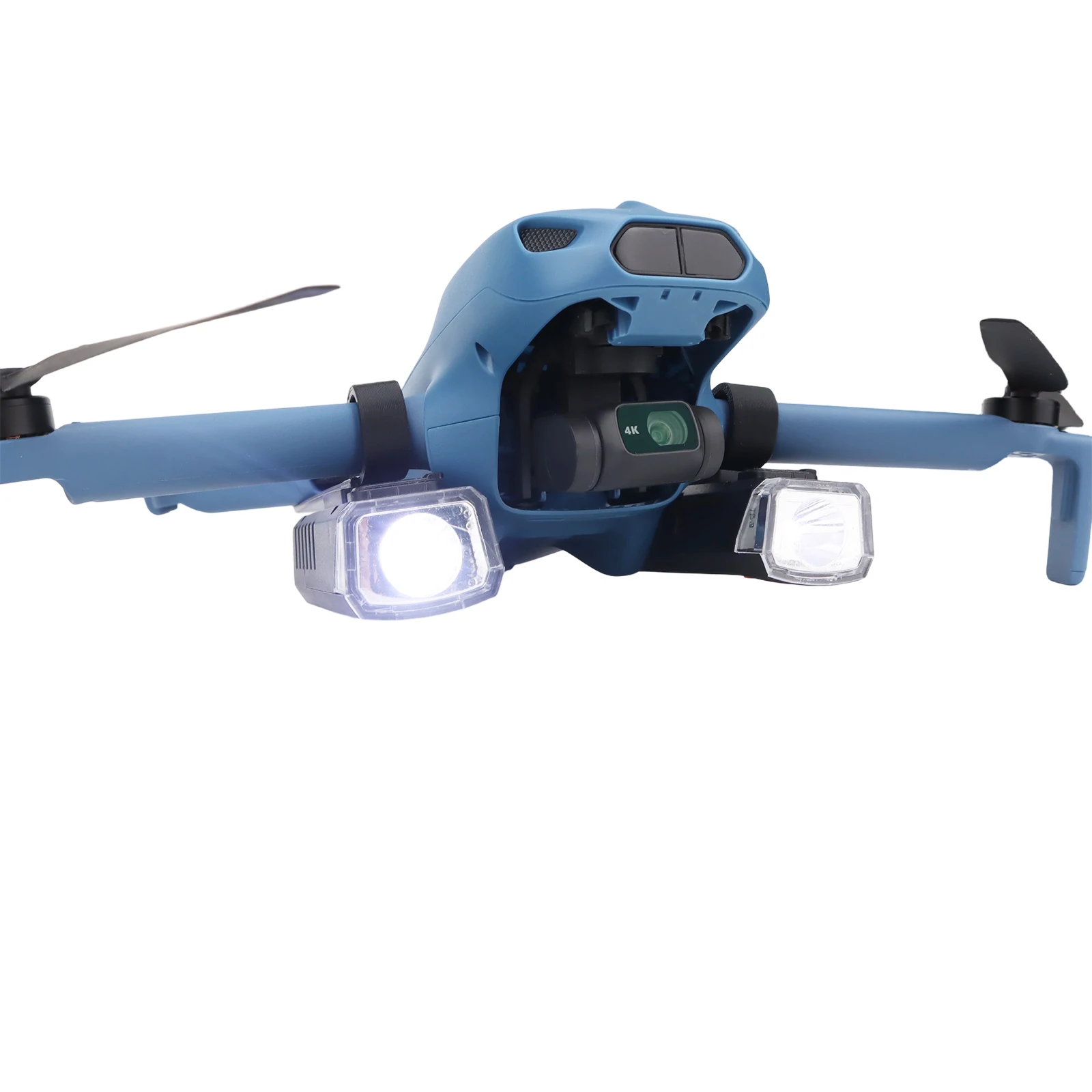 Lampe de navigation nocturne rechargeable pour drone LumenFly MINI en cours de recharge via son port USB, avec indicateur LED rouge.