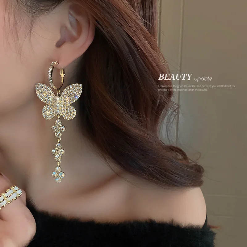

Light luxury diamond-encrusted butterfly fringe earrings 2022 new fashionable temperament high-end atmospheric pendant unique co