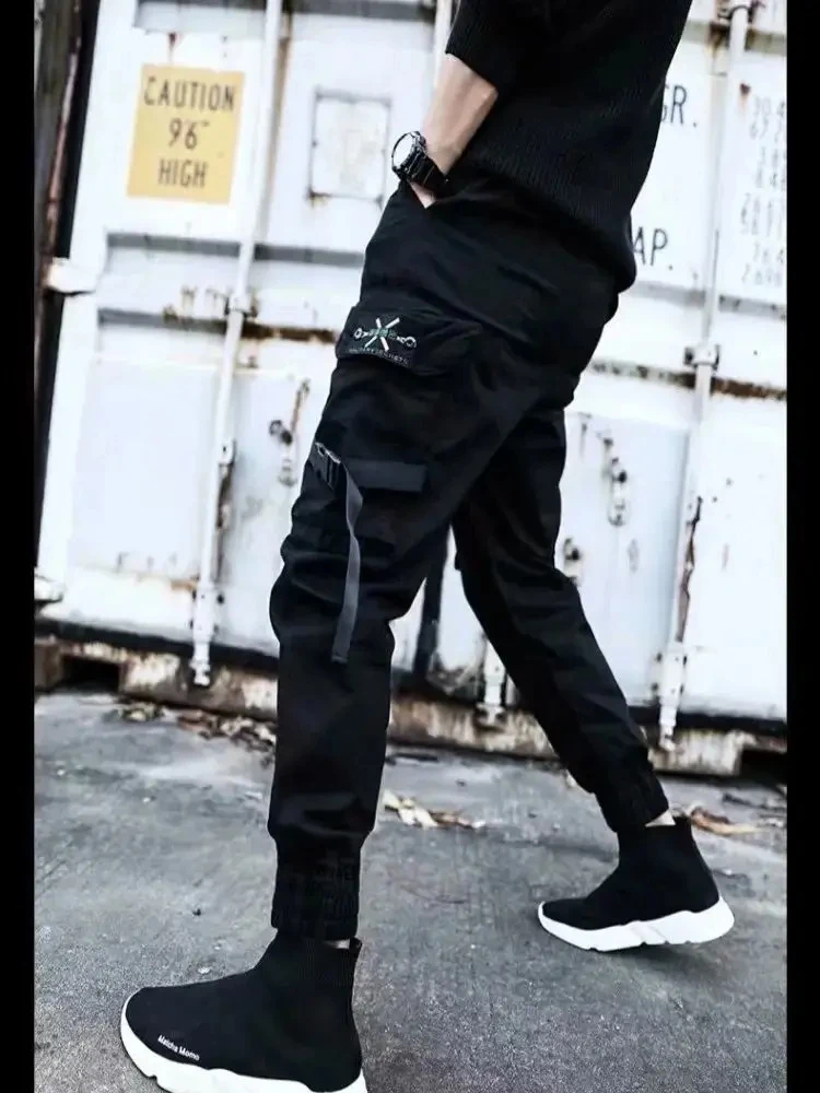 Overalls men's nine-cent casual pants fashion loose-fitting harem pants men's Korean version of the all-in-one leggings men's sl
