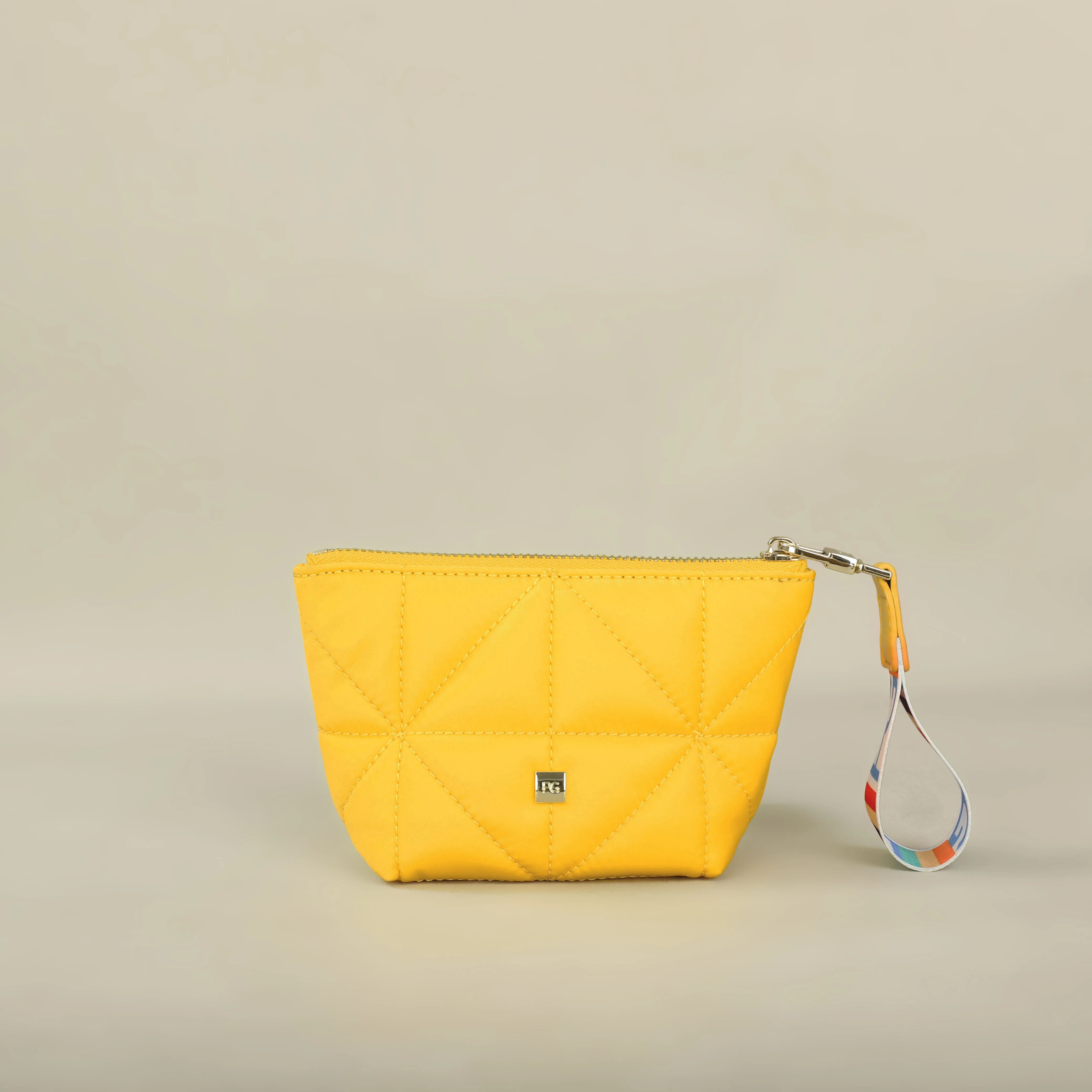 Side view of compact cosmetic and coin bag