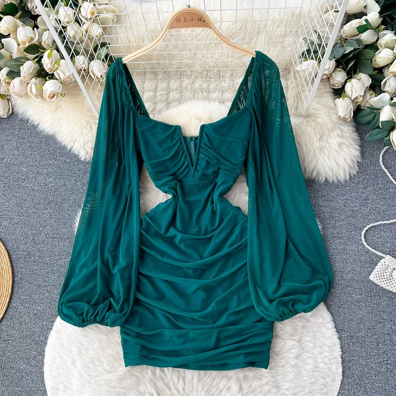 

Fashion Sexy Backless Long Sleeved Mesh Dress for Women with Buttocks Tight Fitting Spicy Girl Short Pleated Dress Mini Dress