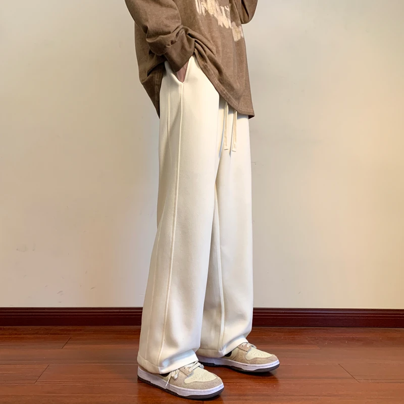 Jesienne spodnie dresowe męskie proste spodnie Casual męskie koreańskie luźne spodnie ze sznurkiem męskie spodnie sportowe Streetwear