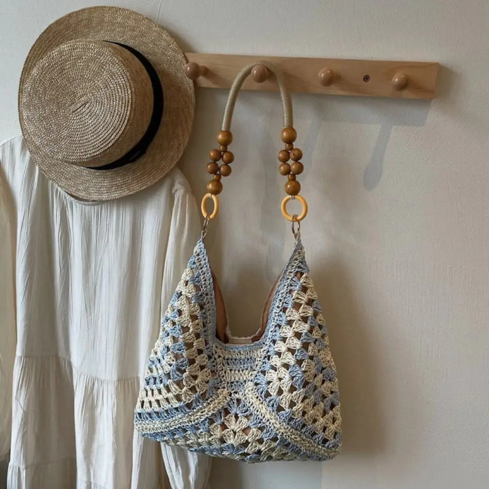 Borsa a secchiello traforata in paglia, grande capacità, stile bohémien, da spiaggia e a tracolla, per le vacanze - immagine 2