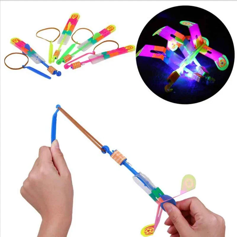 цена 1pc Led Lighting Up Luminous Toy Flying Slingshot Flying Toys Toys Xmas Decor Light Quickly Fast Catapult