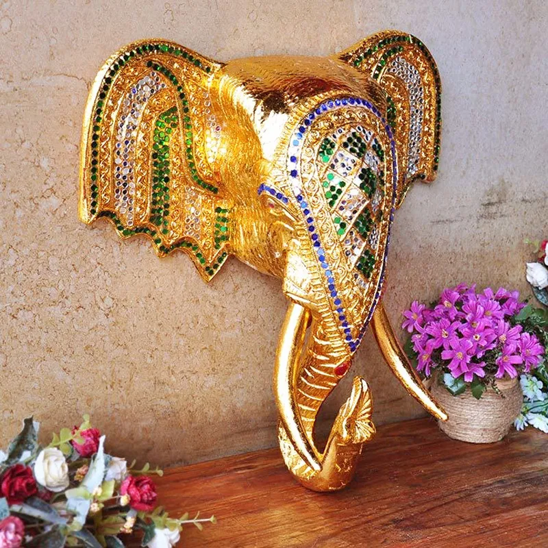 

Southeast Asian style decorations: elephant head, solid wood carved wall decoration, entrance wall decoration
