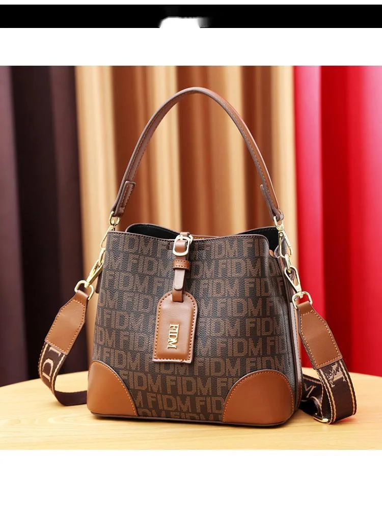 2024 Nuova vendita calda Autunno e inverno Borsa piccola Borsa da donna Tendenza moda Borsa a secchiello in morbida pelle coreana Borsa a tracolla con tracolla da donna_voghion.com