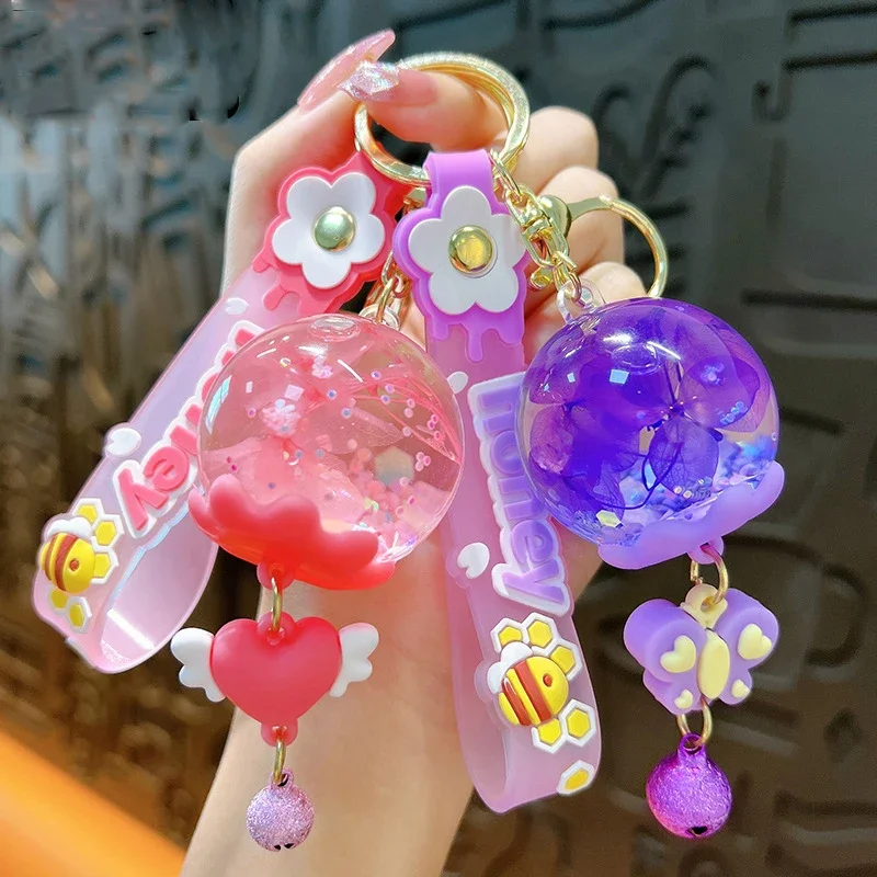 

Candy Color Wind Bells Key Chain Floating Liquid Quicksand Flower Keychain Butterfly Whale Star Pendant Key Ring Gifts for Women