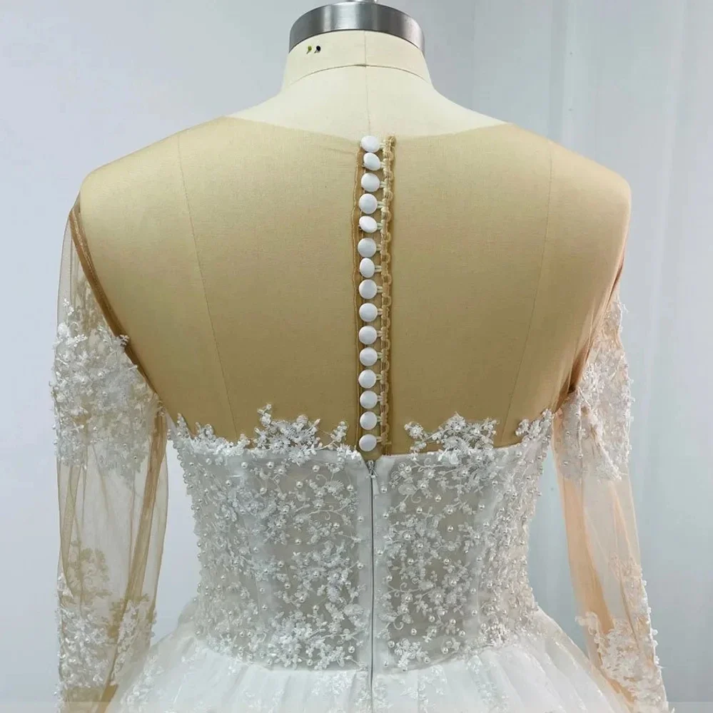 Abito da sposa in tulle con scollo a V e manica a sbuffo – OUTLET SPOSI