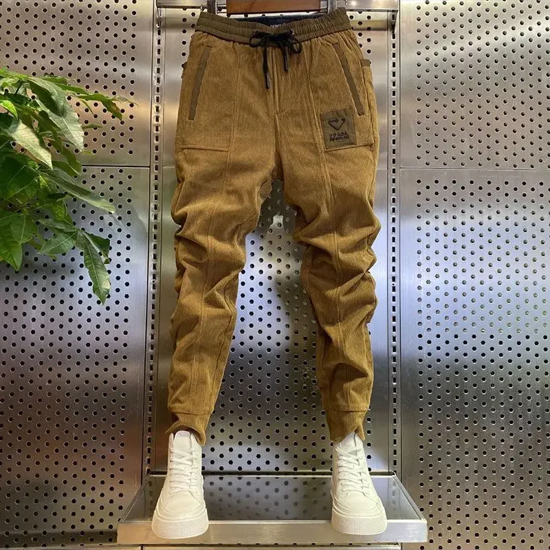 Pantaloni della tuta da uomo in velluto a coste autunno inverno piedi piccoli pantaloni da jogging Harem Streetwear pantaloni Harem in pile Casual pantaloni moda taglie forti