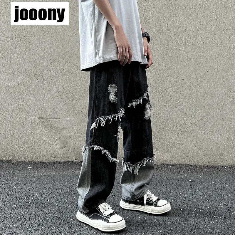 

Y2K Aesthetics Loose Splice High Street Casual Pants with Raw Edges Men's American Tassels Denim Pants Fashion Wide Leg Pants