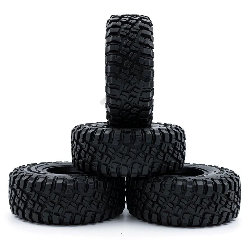 Ensemble de quatre pneus RC Crawler 1.9 pouces posés sur fond noir, idéaux pour une adhérence maximale en tout terrain.
