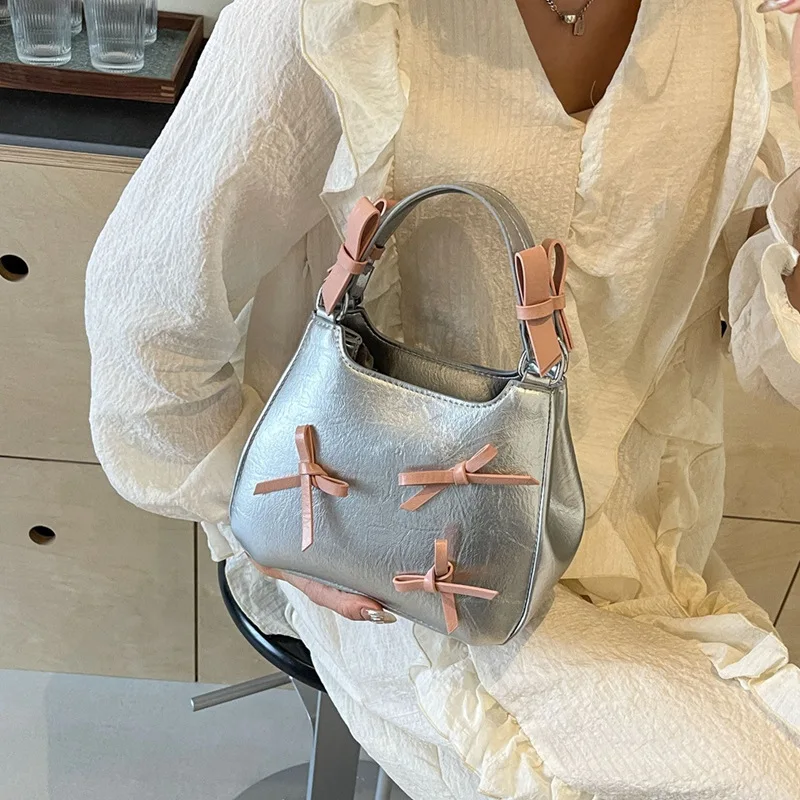 

2024 spring new niche design senior sense of trend bow single shoulder / crossbody / handheld bucket bag