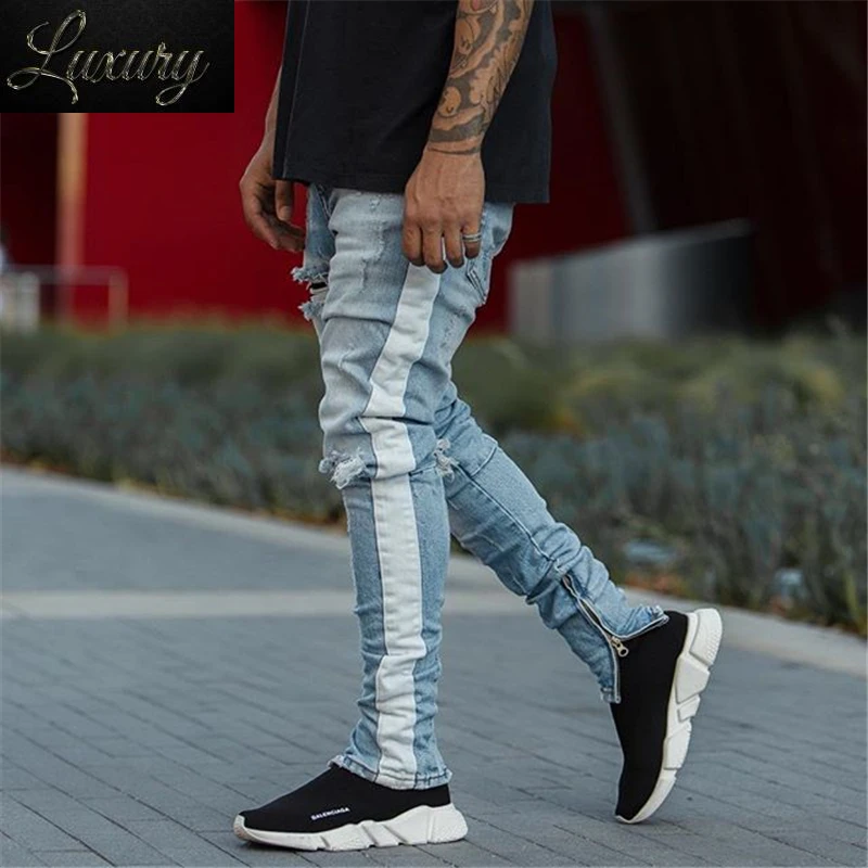 

Men hip hop KANYE WEST Slim Knee Ripped Skinny Jeans White strip Patchwork hole Destroyed Streetwear Ankle zipper Denim Pants