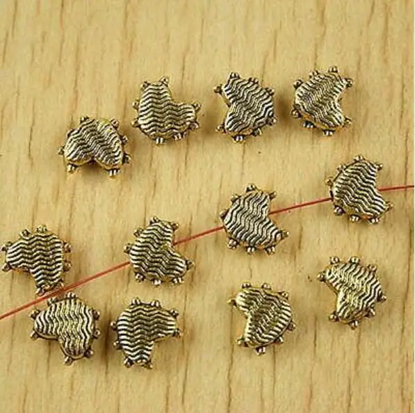 

70pcs dark gold-tone 2sided textured heart shaped spacer beads h2350