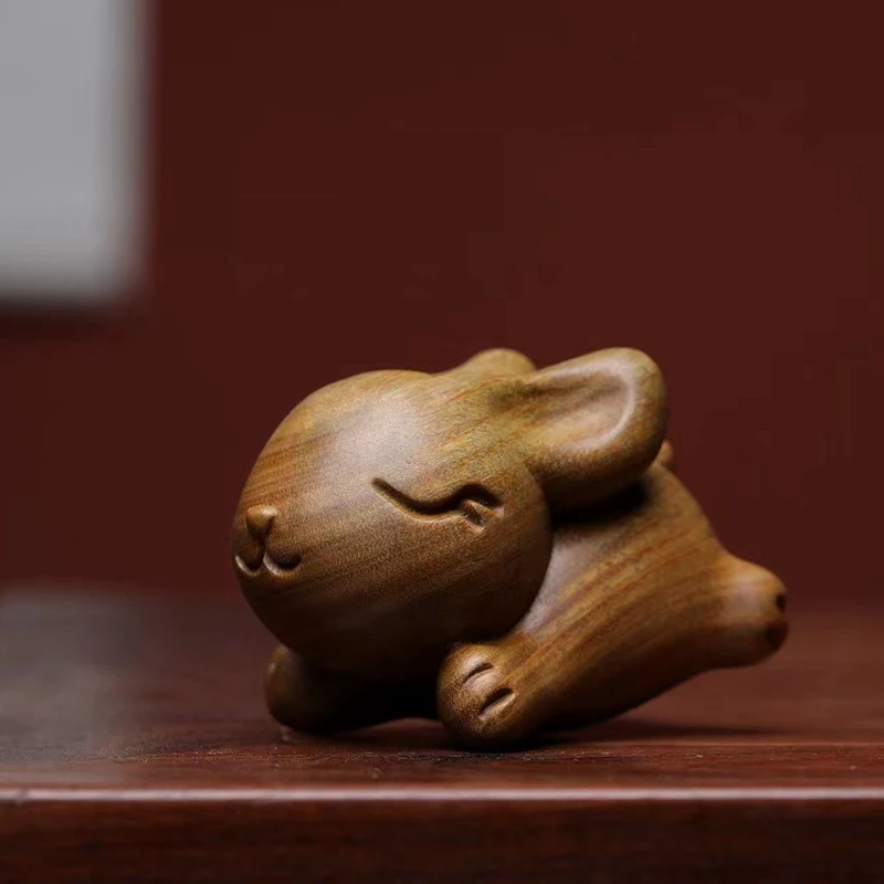 

Green sandalwood running rabbit Zodiac rabbit hand piece sandalwood carving small ornament solid wood stationery play craft gift