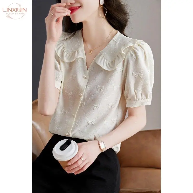 

LINXIQIN Summer New Women's Blouses Korean Peter Pan Collar Female Elegant Sweet Bow Short Puff Sleeve Solid Tops