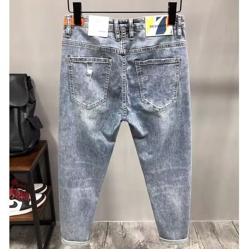Fashion men's casual jeans vintage spring and autumn slim ripped jean pants with HOLE design men clothing luxury cargo pants