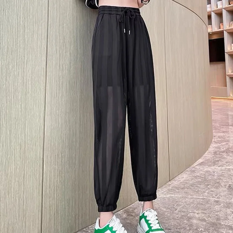 Fashion Loose Elastic High Waist Shirring Bandage Hollow Out Pants Female 2023 New Commute All-match Solid Color Casual Capris