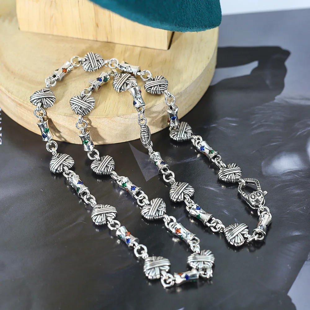 Retro heart -shaped inlaid color galfly round barrel splicing necklace