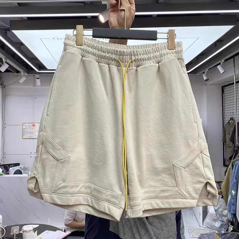 

Solid-colored, heavy-duty, water-washable, five-point basketball shorts
