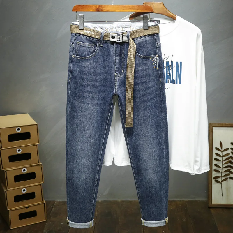 

Autumn and winter new stretch men's jeans slim Korean version of small feet trousers