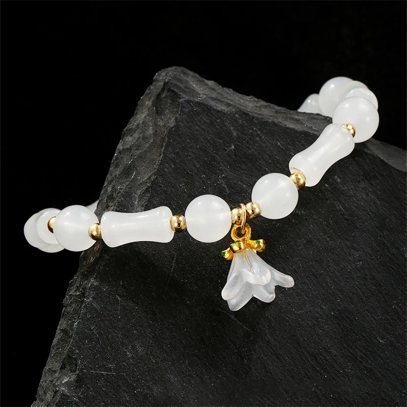 7-teiliges Set „Everyday Sweet Butterfly“-Armbänder – grüne Glasperlen mit zarten Anhängern für einen mühelosen, femininen Stil. – Detail 16