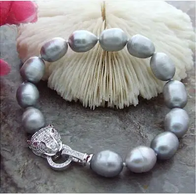 

Красивый новый стиль 10 мм павлиний черный круглый браслет с пресноводным жемчугом 19 ~ 21 см Прямая поставка