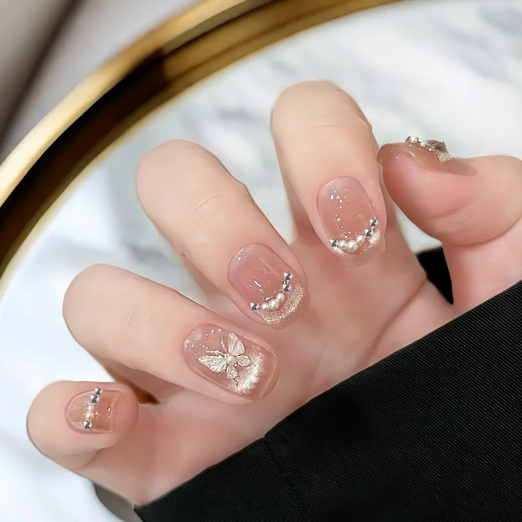 Blush Butterfly Nail Design for Women