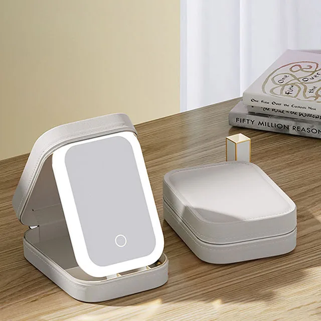 حقيبة مكياج نسائية مزودة بمرآة قابلة لإعادة الشحن...