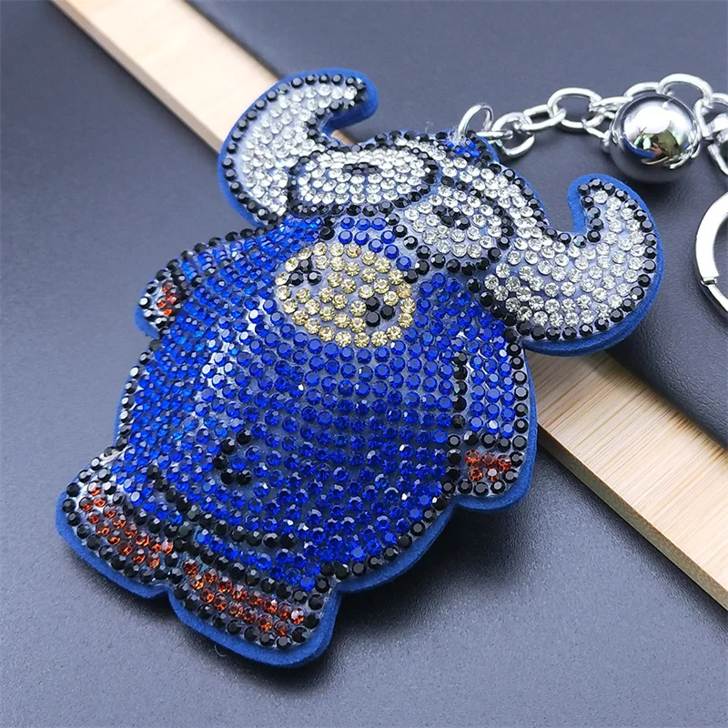 Cartoon Ox Bull Keychain for Women Men Blue Tassel