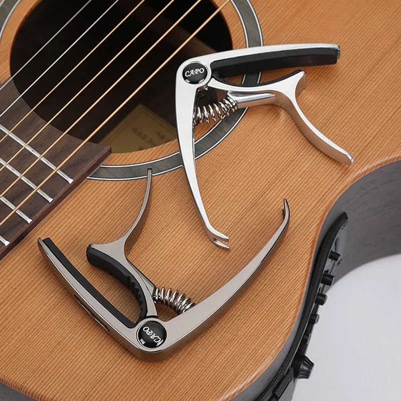 Description Picture 6 of itemMiwayer Aluminum Alloy Guitar Capo Metal Guitar Tuner Picks Holder Professional Capo for Acoustic Electric Guiter Ukulele Bass