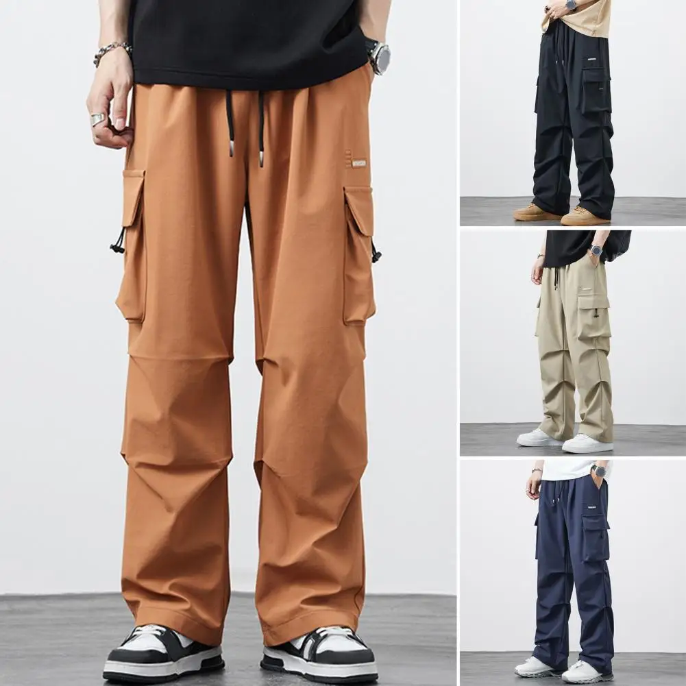 

Брюки-карго мужские с широкими штанинами, тонкие прямые однотонные свободные штаны с множеством карманов, с эластичным поясом, в стиле хип-хоп, уличные штаны