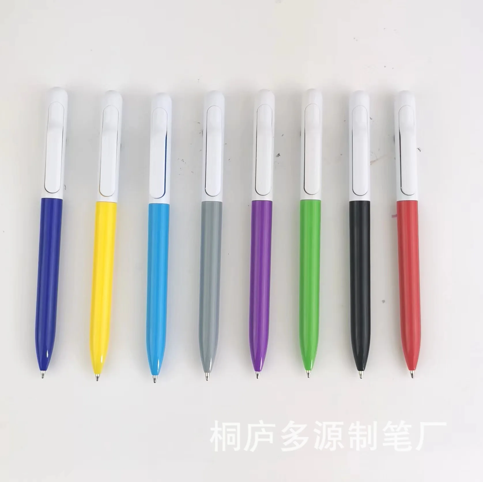 

New direct selling plastic rotating ballpoint pen advertising gift pen 100 mixed colors