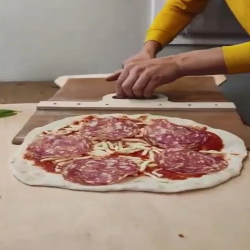 https://ae01.alicdn.com/kf/Se0e946b4019545069da611285acf0e87D/Sliding-Pizza-Peel-Pala-Pizza-Scorrevole-Sliding-Pizza-Sliding-Pizza-Peel-Charcuterie-Board-Pizza-Spatula-Paddle.jpg