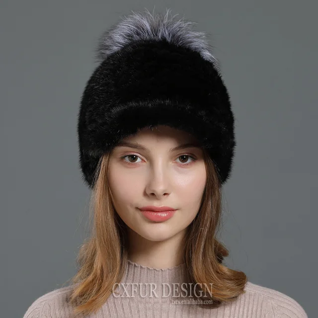 Stay fashionable and warm this winter with the CX-C-24D Winter Hand Knitted Genuine Mink Fur Cap Hat with Fox Fur Pom