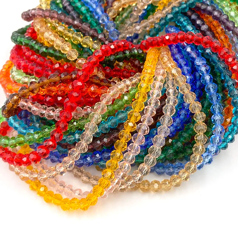 Brins de perles de verre en forme de larme à facettes en gros pour