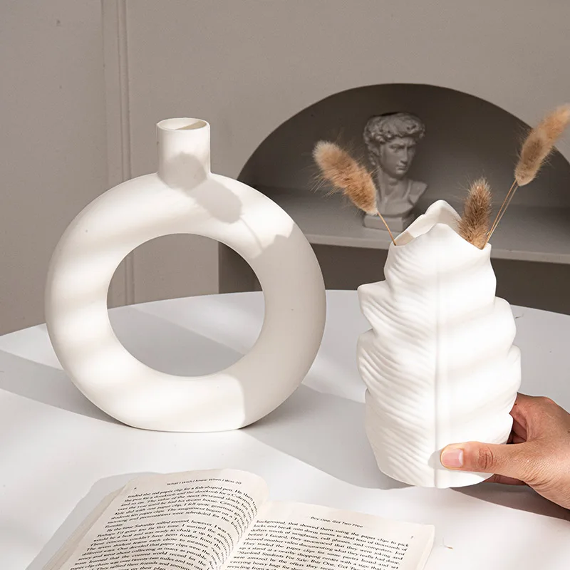 Description Picture 4 of itemDecorative White Flower Bottle Modern Plastic Flower Vase Living Room Decoration Vase for Plant Desktop Ornament Wedding Decor