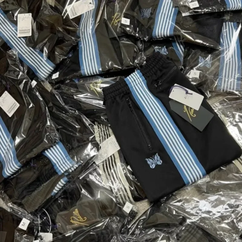 

Needles AWGE Jackets Blue Butterfly Embroidery Stripes Black AWGE Sweatpants Needles Tracksuit for Men Women