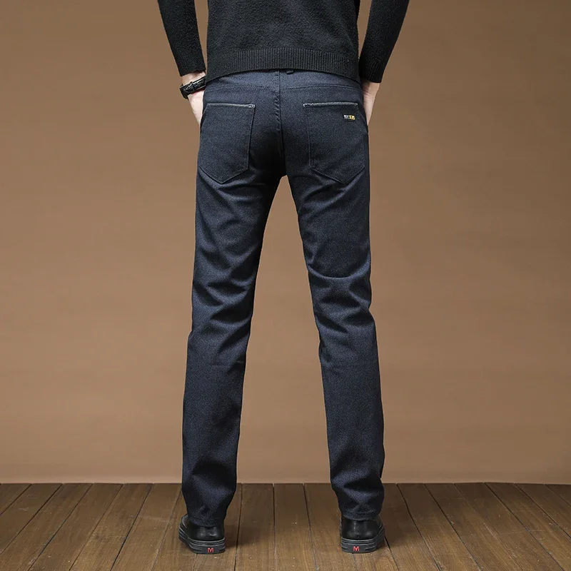 Pantaloni casual da lavoro dritti da uomo autunnali Tessuto spazzolato elastico Pantaloni slim fit morbidi e accoglienti Abiti maschili di moda coreana 4