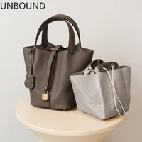 Sac seau en cuir véritable UNBOUND pour femme, en cuir de vachette pleine fleur Togo, sac à main de luxe pour mariage, sac fourre-tout minimaliste, élégant, pour les trajets quotidiens, nouveauté 1