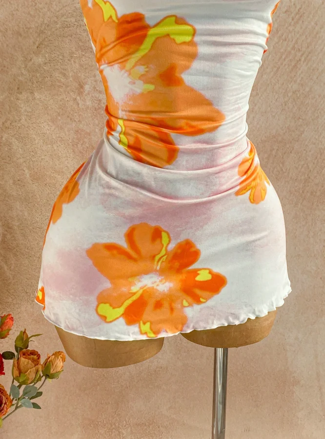 Robe mini moulante pour femme, col licou, imprimé floral, fronces latérales, ourlet à volants, style Y2K, été 2026, plage tropicale, soirée, sortie
