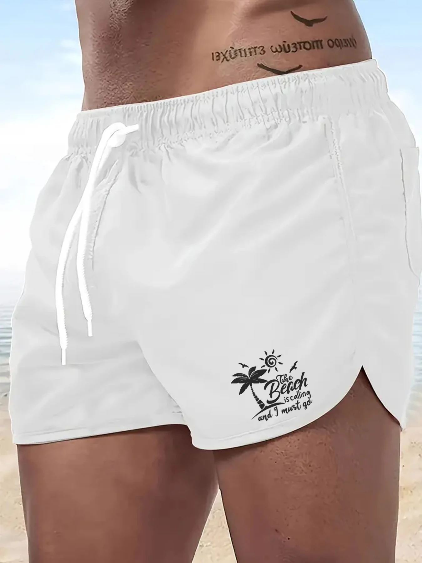 מכנסי חוף לגברים עם דוגמת עץ קוקוס מתאימים למסיבות גלישה בחוף הים הטרופי