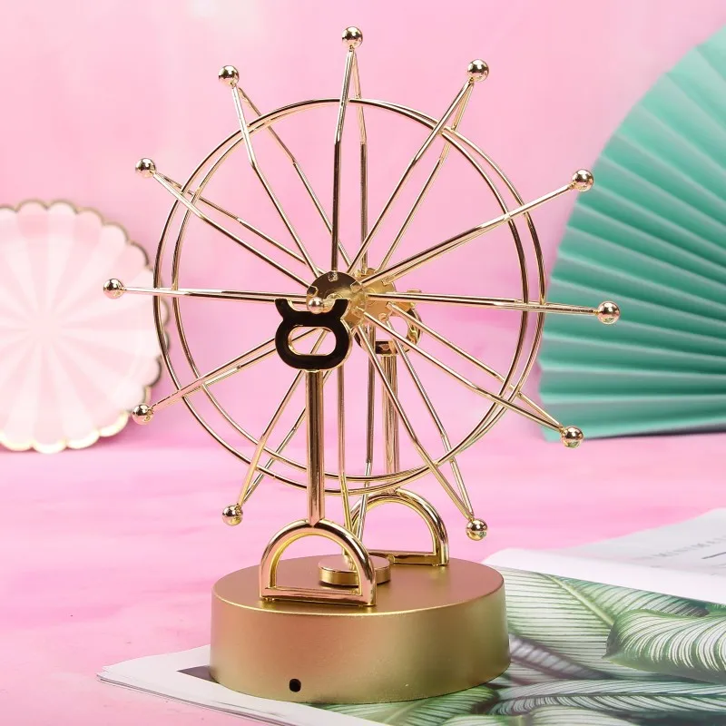 

Nordic creative Ferris wheel wiggler metal gold perpetual planetarium office home decoration magnetic ornaments