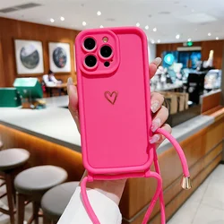 Custodia per telefono in silicone a forma di cuore con tracolla e spallina.