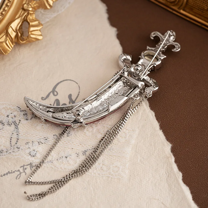 Light luxury vintage court style scimitar dagger brooch for women