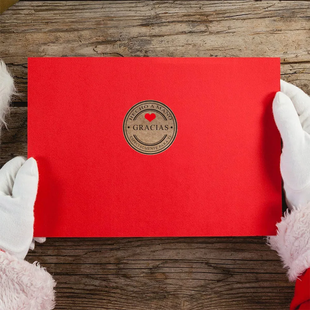 Gracias labels arranged beside wrapped gifts